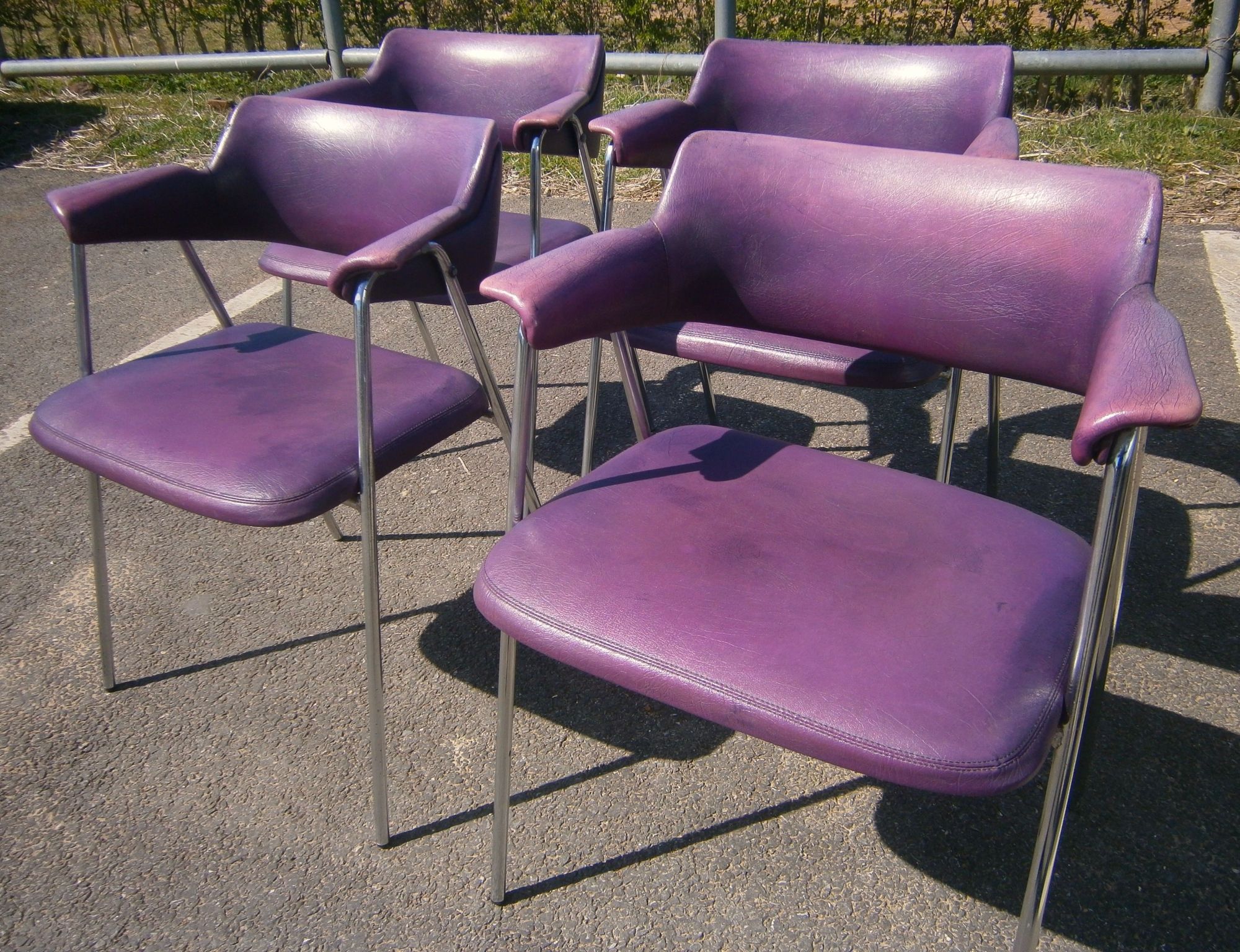 A set of four 1960s chrome framed Pel style elbow chairs